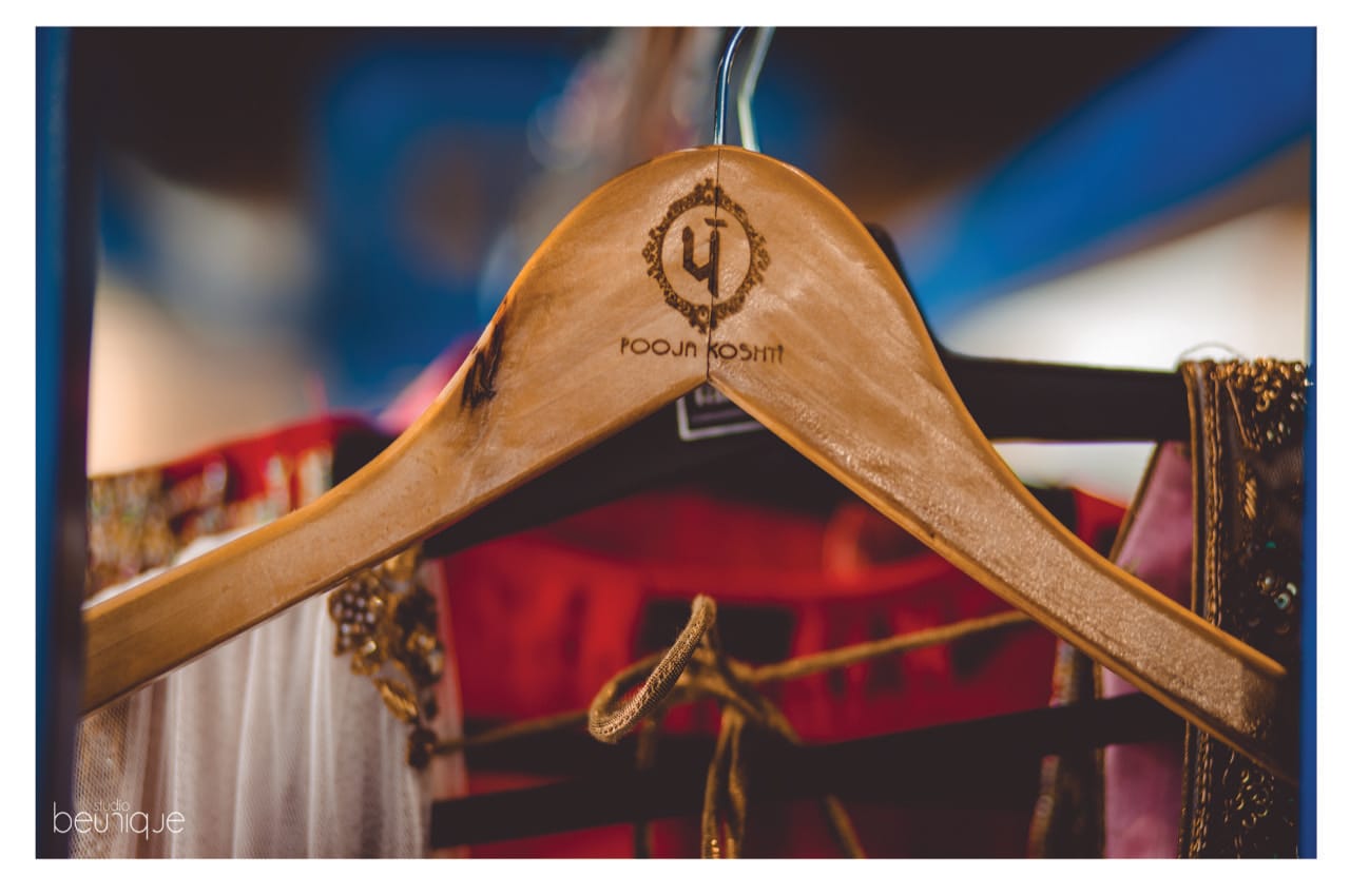 a wooden hanger hanging