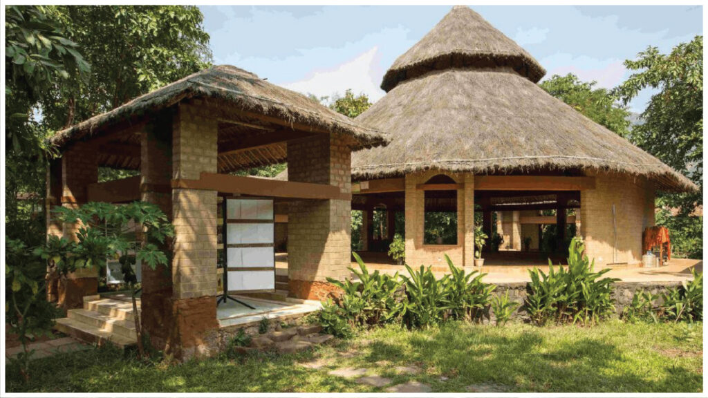 Sustainable architecture in Gujarat featuring climate-responsive buildings, shaded courtyards, and eco-friendly design solutions